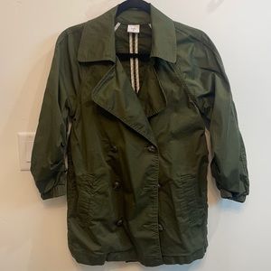 Olive green double-breasted Cabi jacket.